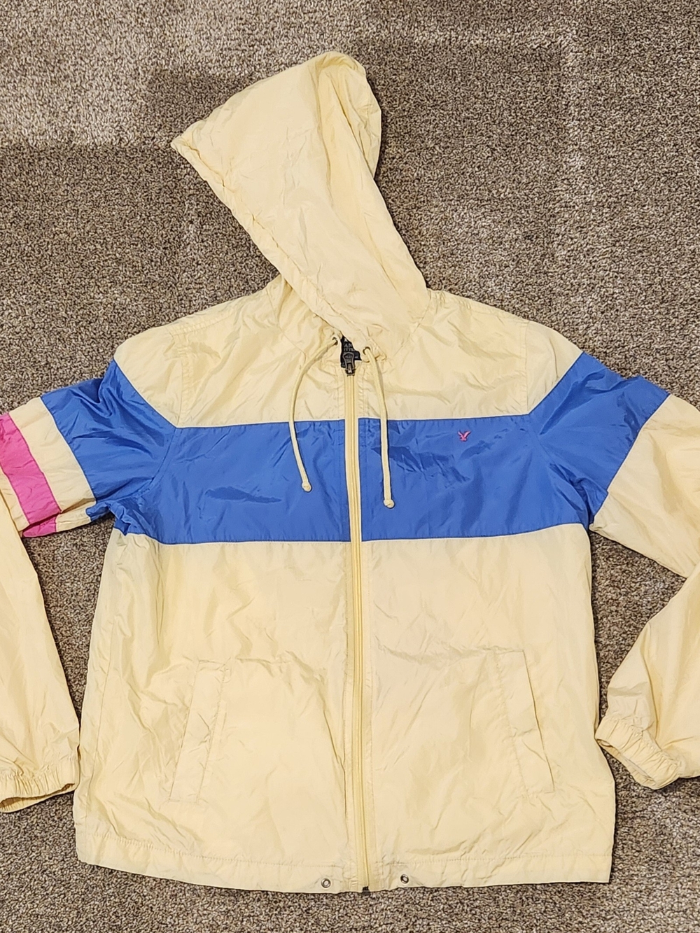 Light Yellow Hooded Windbreaker Jacket with Blue Stripe
